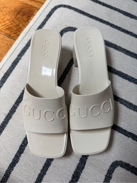 Gucci Shoes - Gucci Cream Embossed Logo platform slide